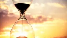 An hourglass showing time is running out.