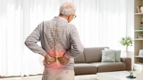 Older man with back pain