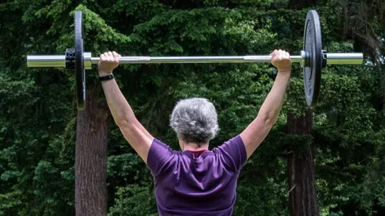 Older woman lifting weights